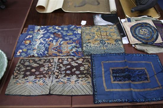 A group of Chinese late Qing dynasty embroidered panels including a Mandarin square